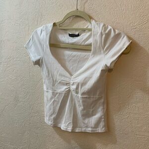 White Brandy Melville tshirt, likely size small or extra small